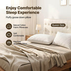Bed with white pillows and beige bedding, featuring text about a fluffy goose down pillow.