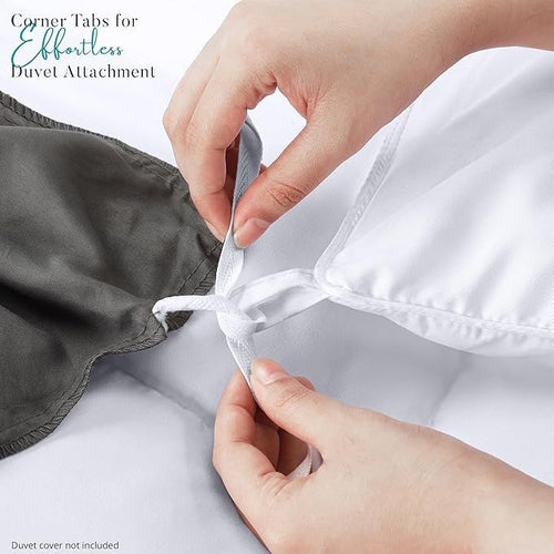 Hands attaching corner tabs to a white duvet cover with text 'Corner Tabs for Effortless Duvet Attachment'.