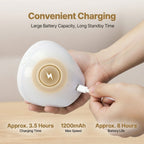 Hand holding a white noise machine device with charging cable, on a beige background.