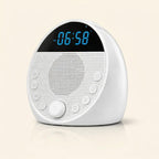 Deep Rest White Noise Machine with a white casing on a beige background