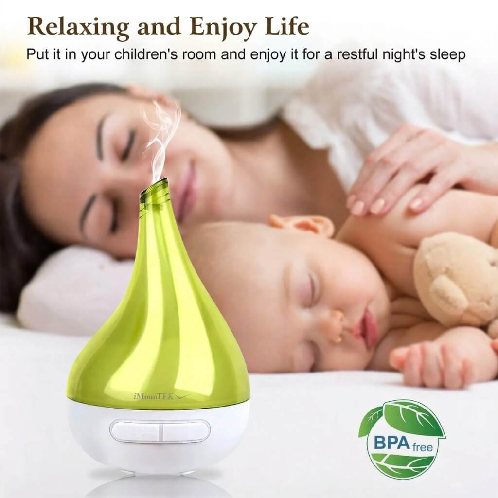Woman and child sleeping with a green diffuser in the foreground, promoting relaxation and rest.