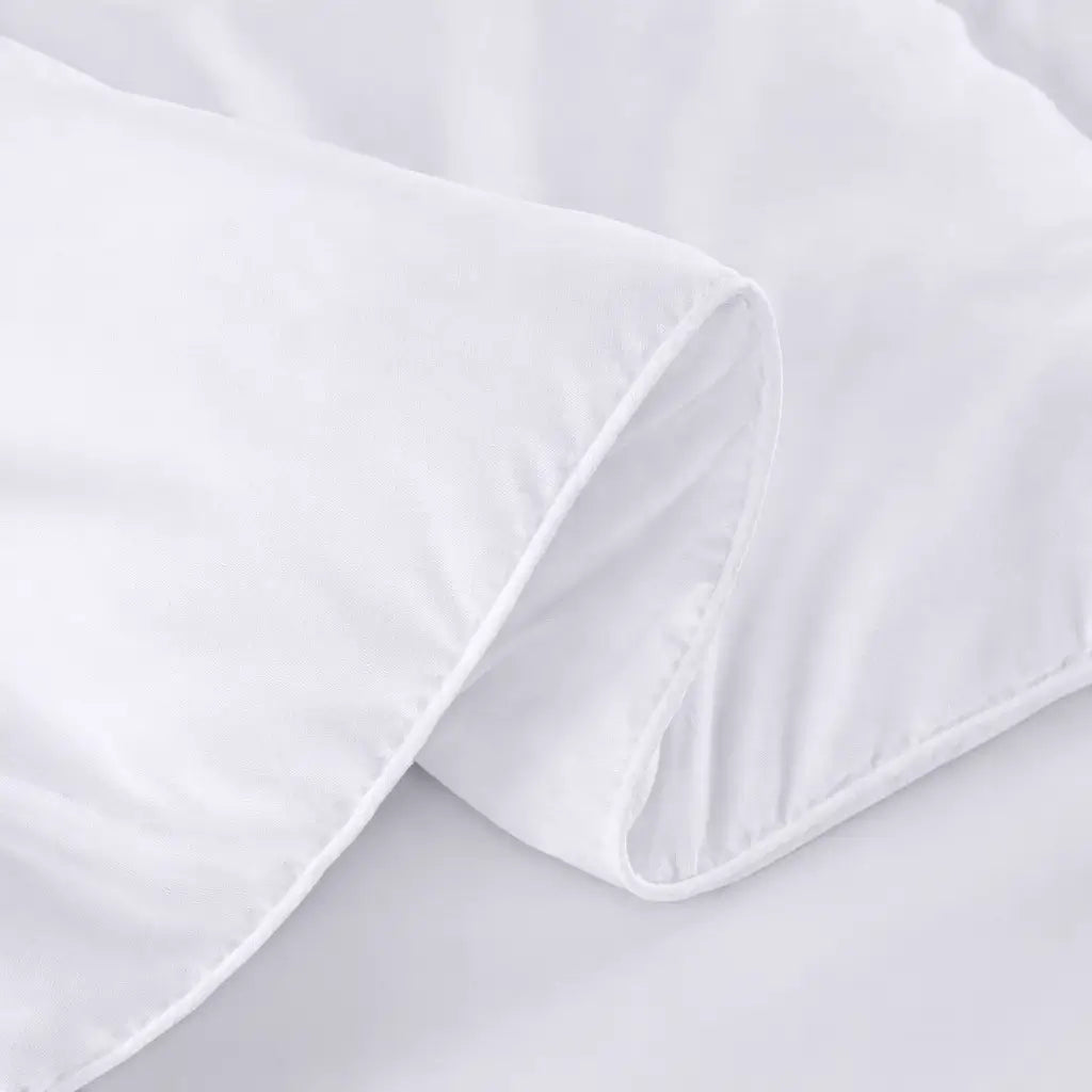 White pillowcases on a light gray background
