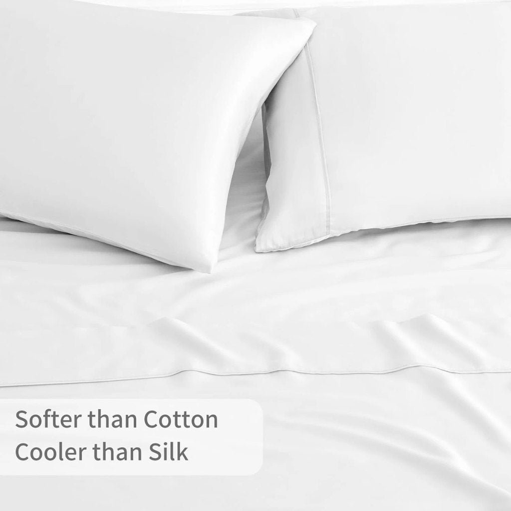 White satin pillowcases on a white background with text 'Softer than Cotton, Cooler than Silk'.