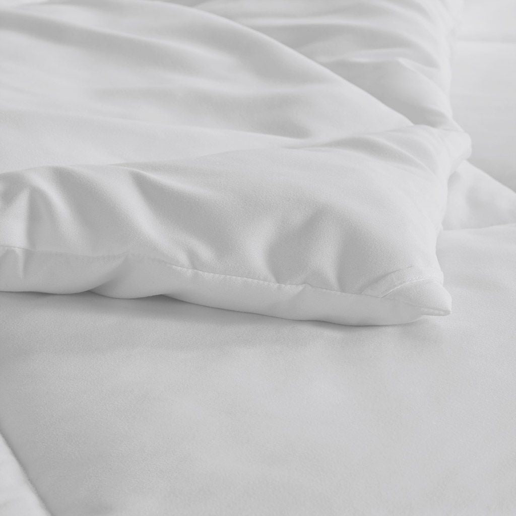 white comforter  suitable for the climate 
