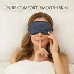 Woman wearing a blue sleep mask with text 'PURE COMFORT, SMOOTH SKIN' on a white background