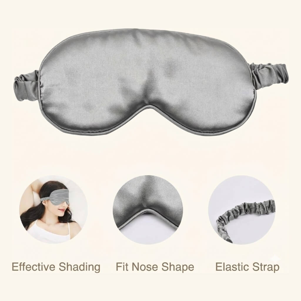 Gray satin eye mask with features highlighted on a white background
