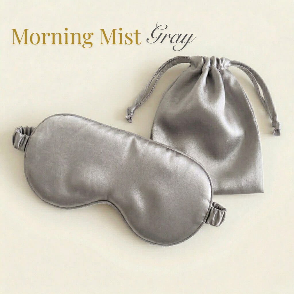 Gray satin eye mask and pouch on a beige background with 'Morning Mist Gray' text.